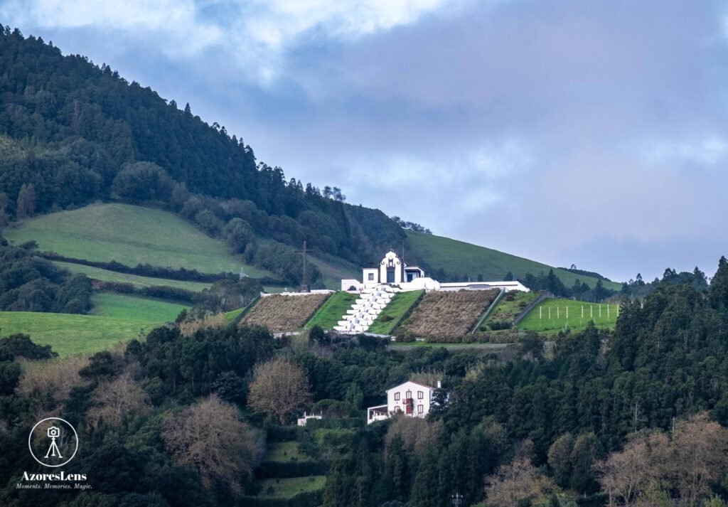 Breath-taking panorama of Vila Franca do Campo and Ermida de Nossa Senhora da Paz. A picturesque view capturing the natural beauty of São Miguel Island in the Azores.